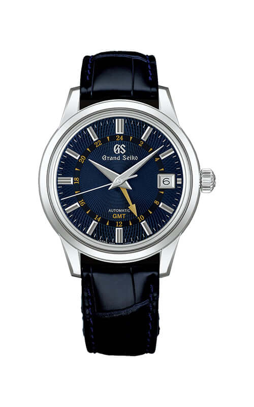 Grand Seiko watch with blue dial and black leather strap on a white background
Grand Seiko Elegance Mechanical GMT SBGM257G Bandiera Jewellers