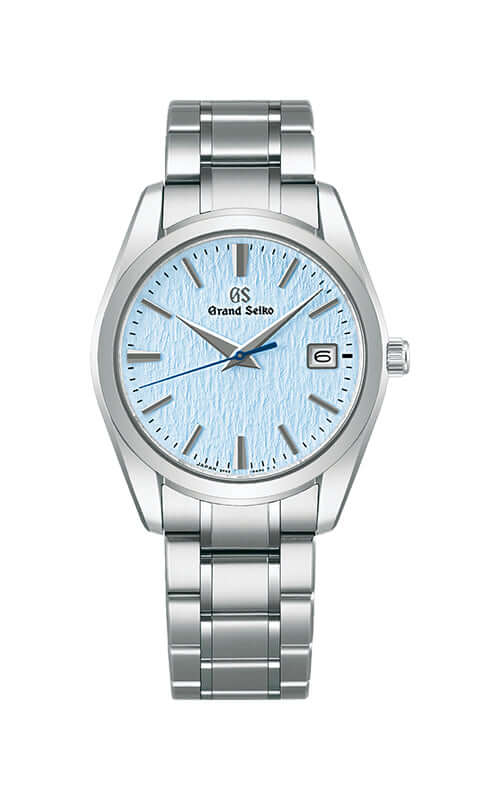 Silver wristwatch with a light blue dial on a white background
Grand Seiko Heritage Collection SBGX357G Bandiera Jewellers