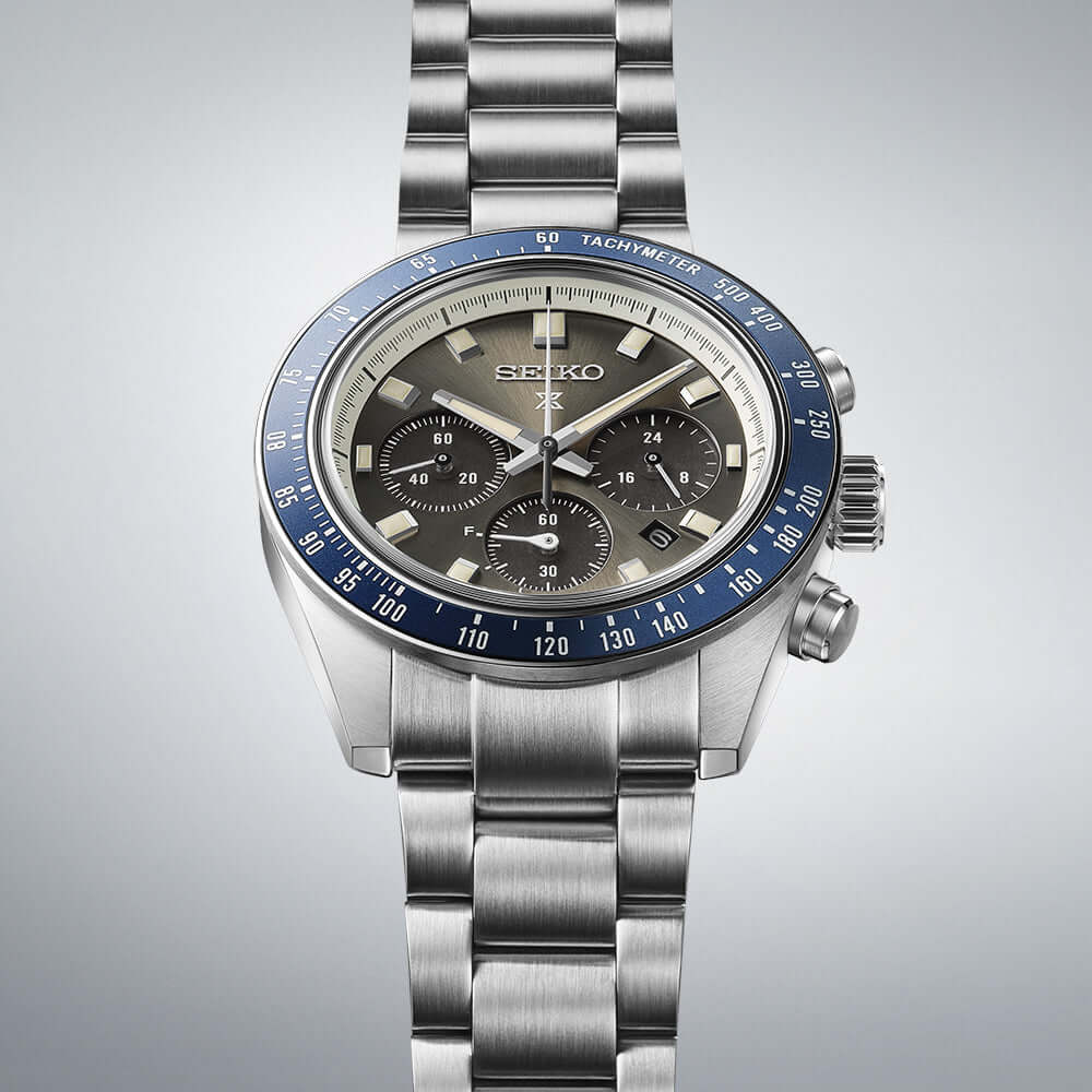 Seiko watch with silver and blue design on a gray background
Seiko Prospex Speedtimer Solar Chronograph SSC939P1 Bandiera Jewellers