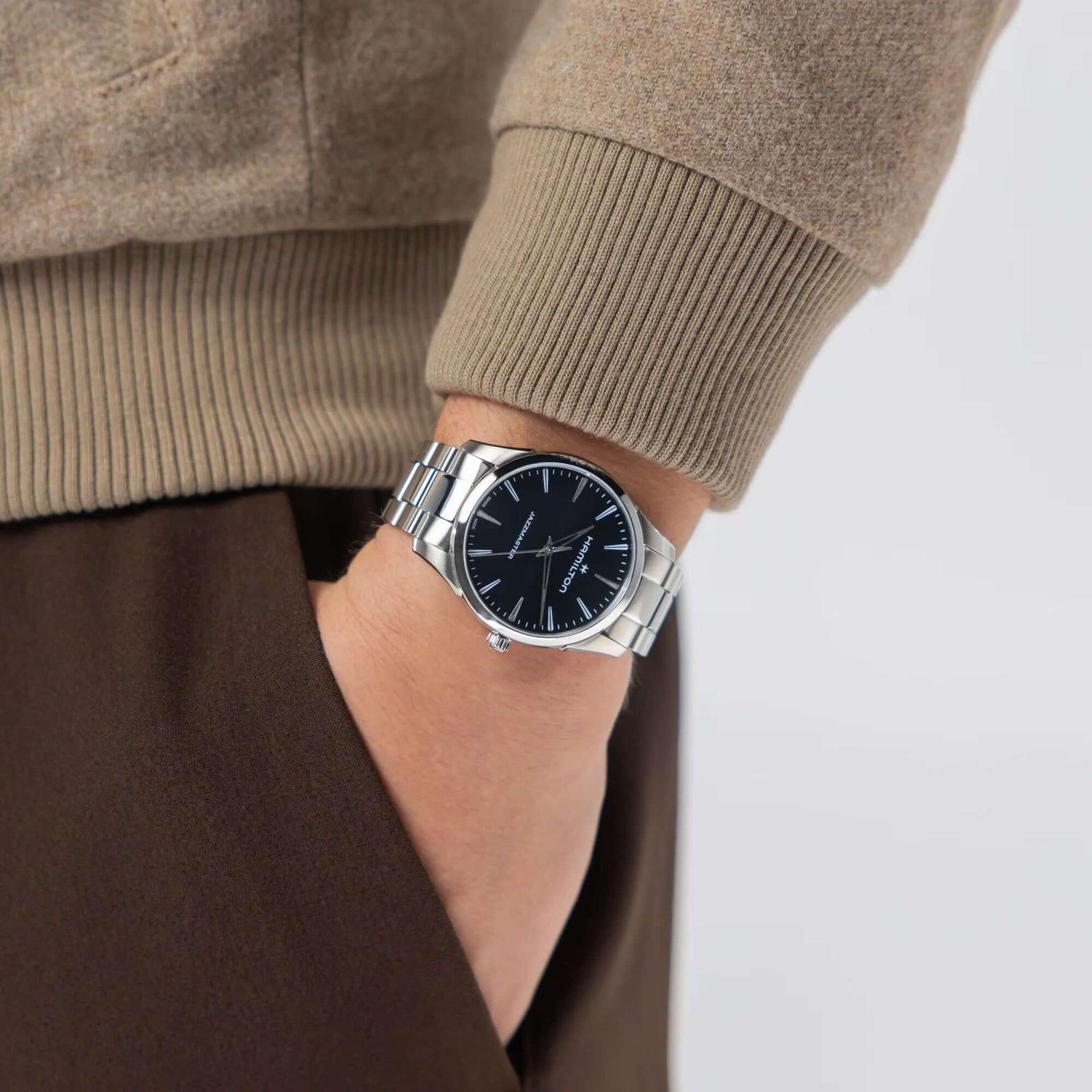 Silver watch on a wrist with a neutral background
Hamilton Jazzmaster Quartz 40mm H32461131 Bandiera Jewellers