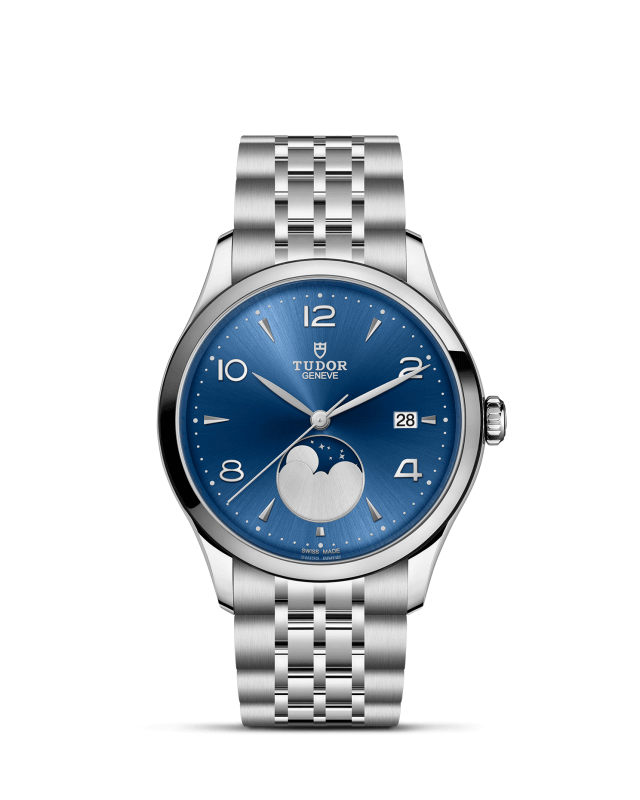 Tudor watch with blue dial and silver bracelet on a white background
Tudor 1926 Luna M91560-0002 Bandiera Jewellers