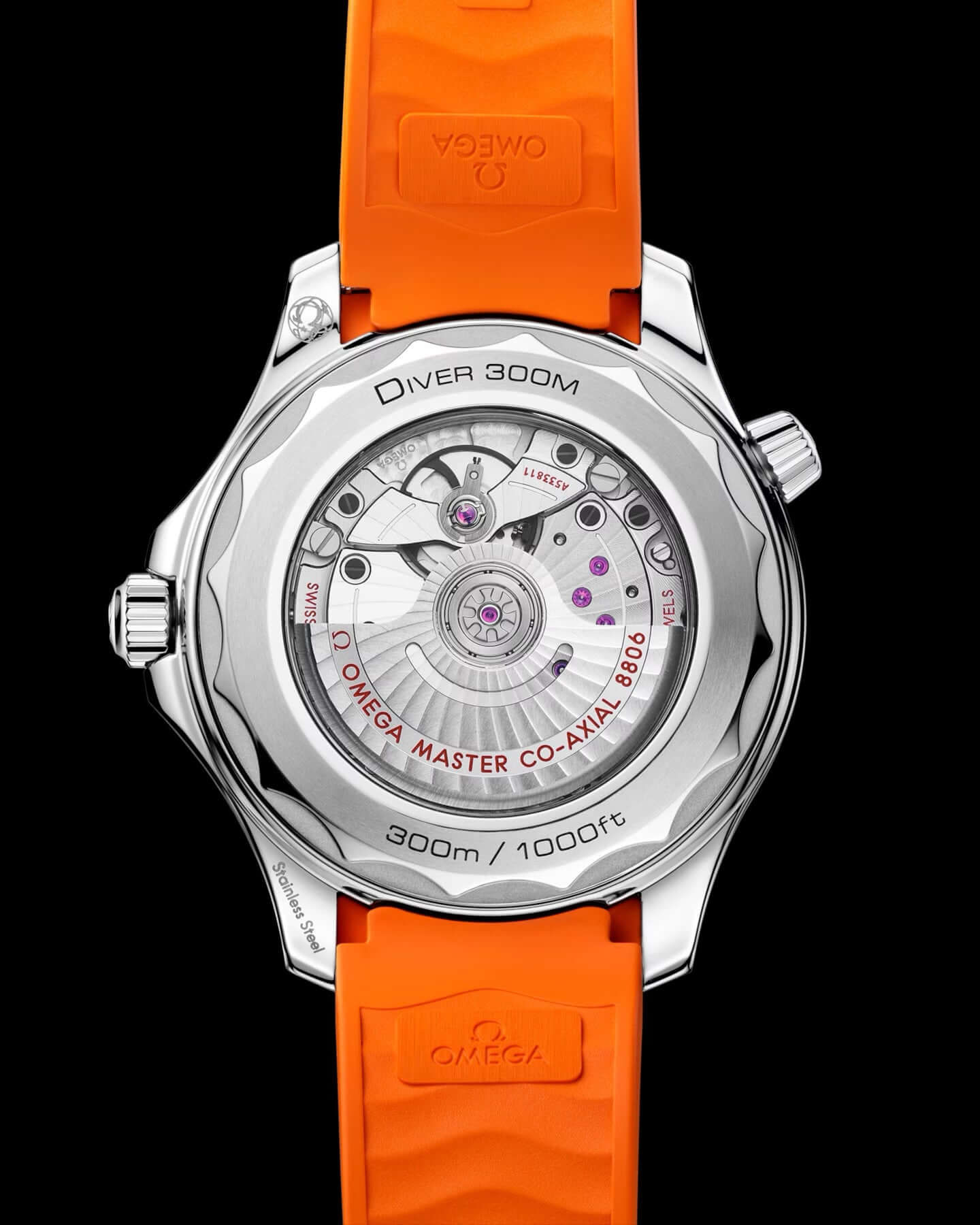 Watch with orange strap and visible Omega branding on a black background