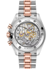 A luxury two-tone stainless steel and rose gold wristwatch with a transparent back, showcasing a complex mechanical movement with gold, silver, and red accents. The watch features a multi-link bracelet with alternating silver and rose gold segments, and is photographed on a clean white background.