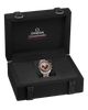 Omega Speedmaster Professional watch in a black display case on a white background
