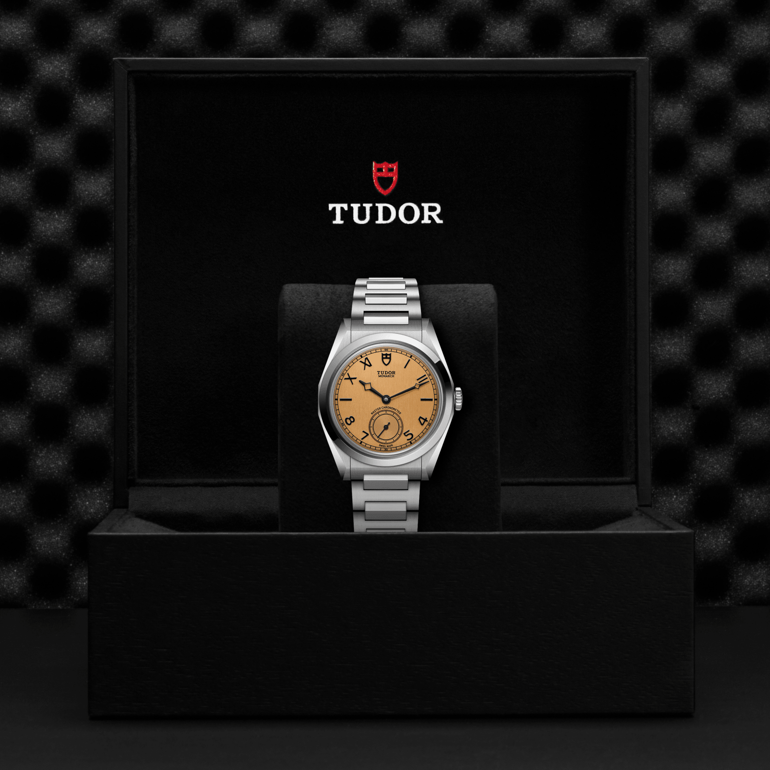 Tudor watch in a black display case with the Tudor logo.
Tudor Monarch M2639W1A0U-0001 Bandiera Jewellers