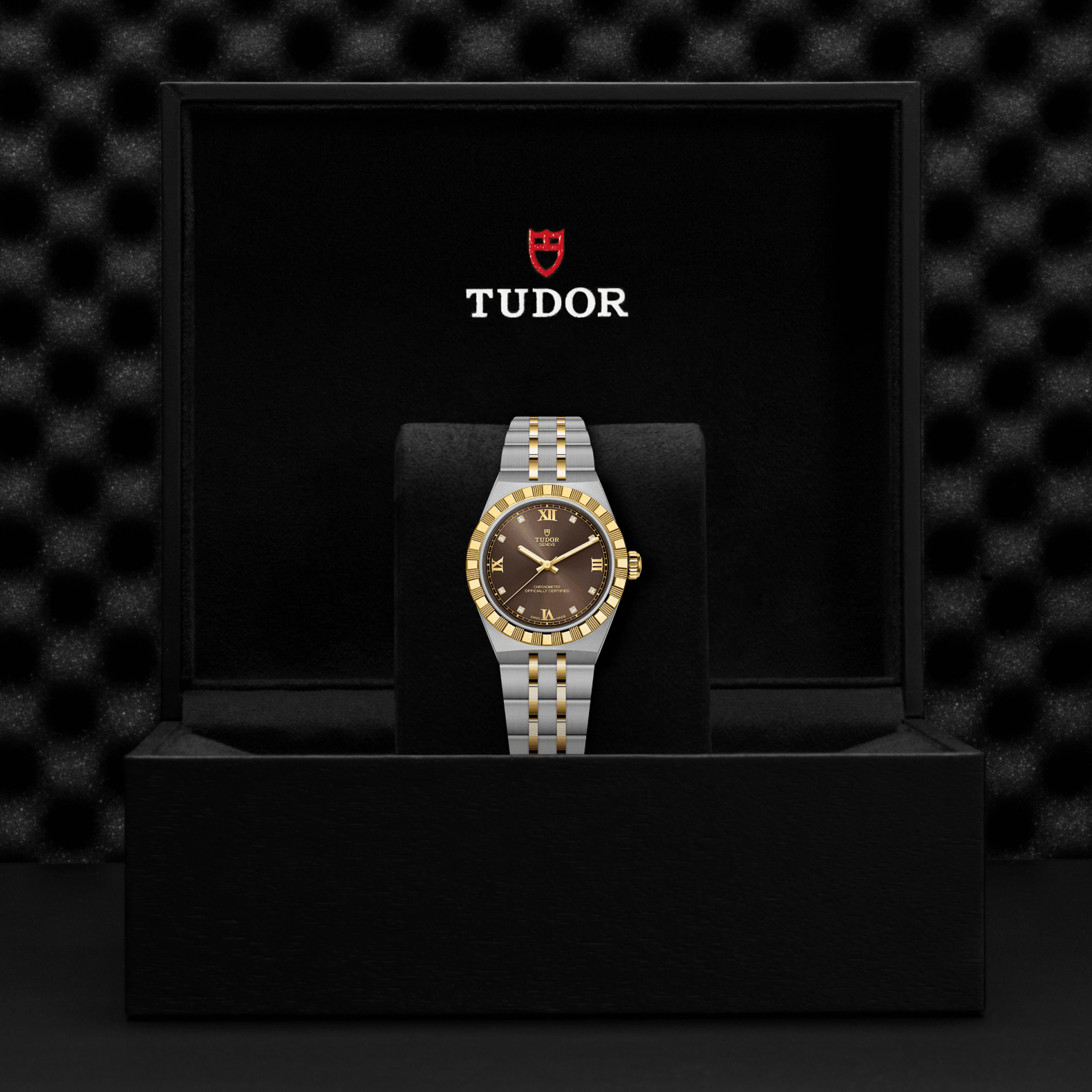 Tudor watch in a black box with the Tudor logo on a dark textured background
Tudor Royal 30mm M2830A1A3-0001 Bandiera Jewellers