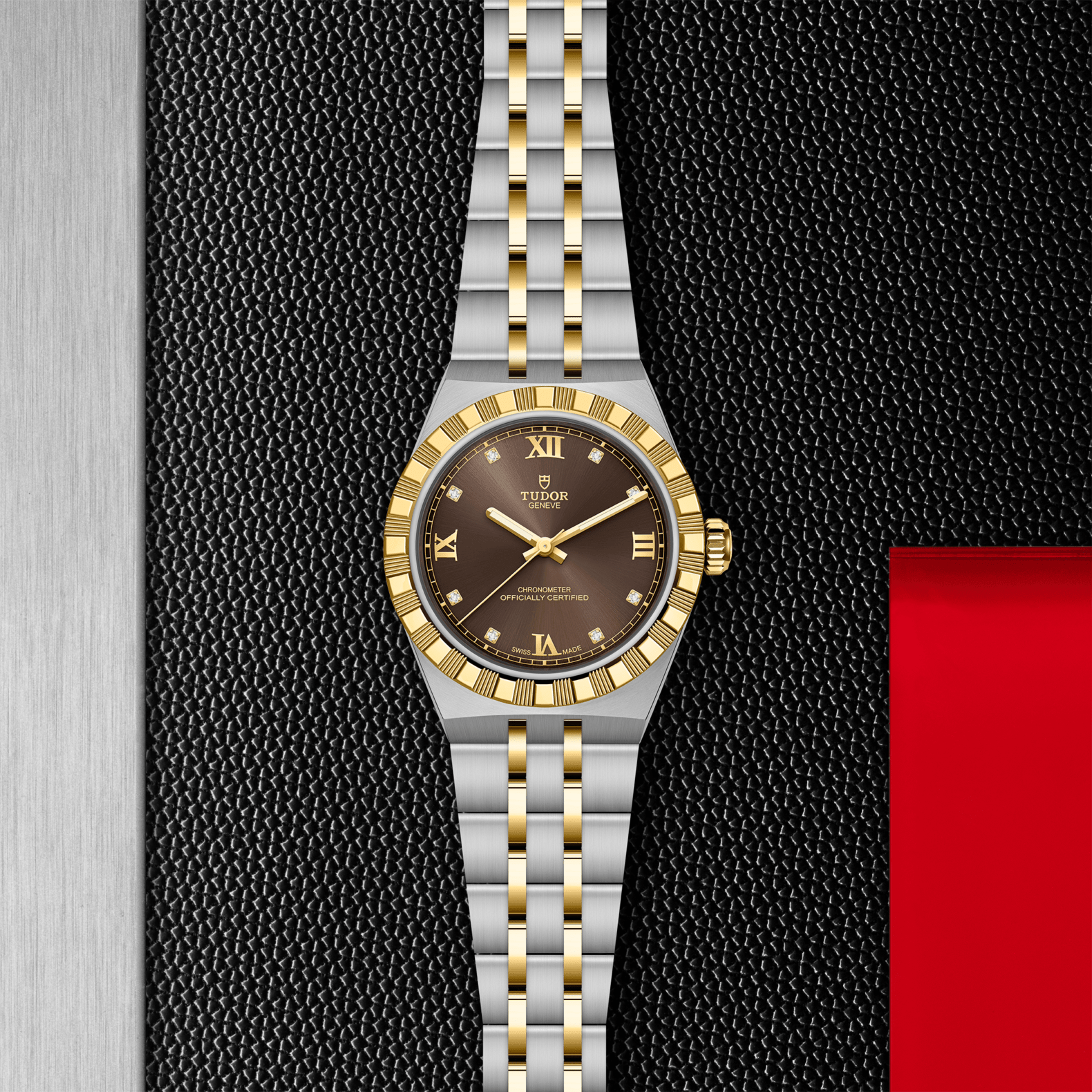 Two-tone watch with silver and gold band on a textured black background
Tudor Royal 30mm M2830A1A3-0001 Bandiera Jewellers
