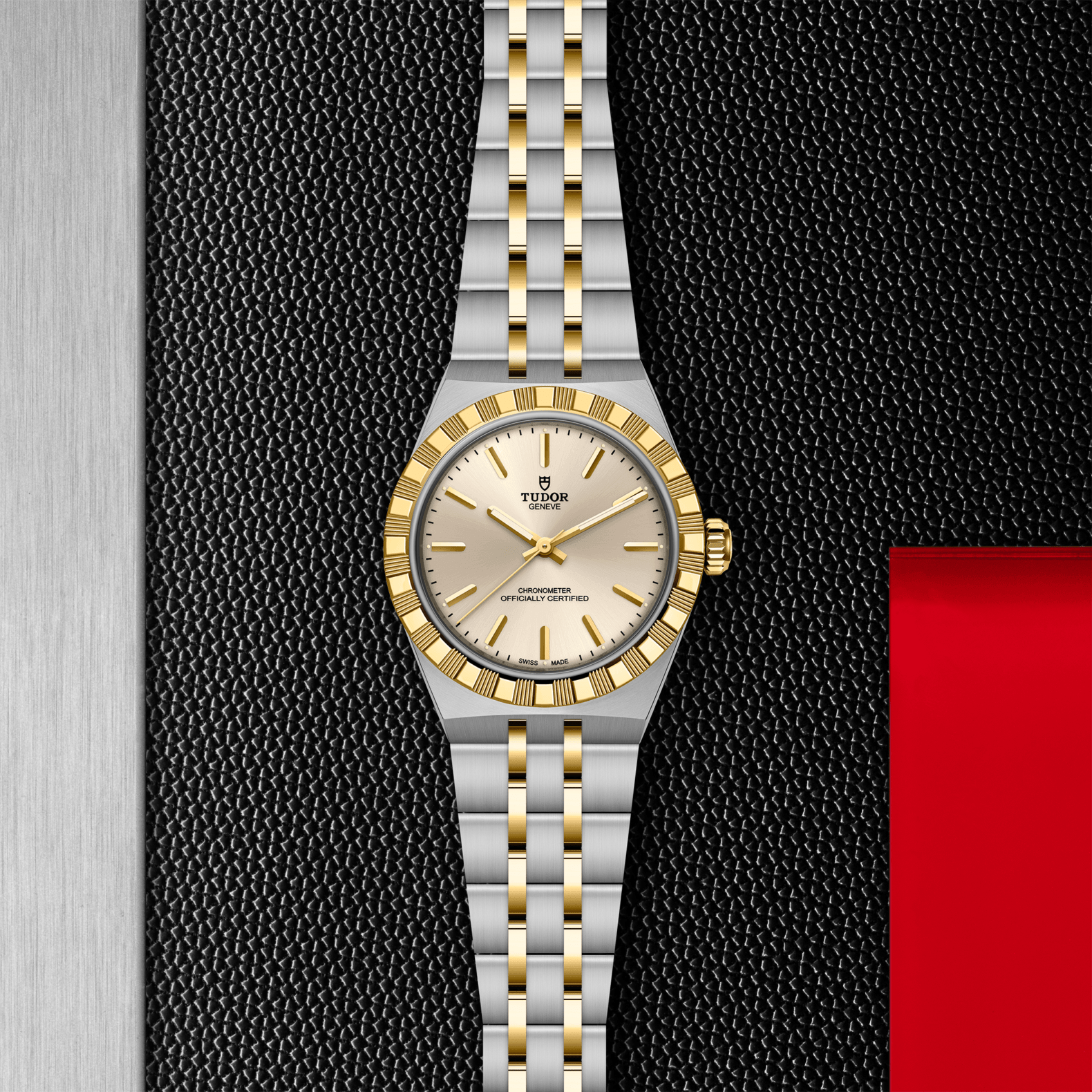 Two-tone watch with silver and gold band on a textured black background
Tudor Royal 30mm M2830A1A3-0003 Bandiera Jewellers