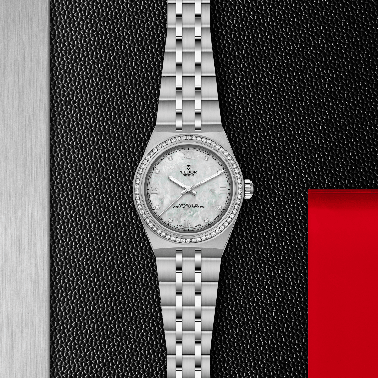 Silver watch with a textured black background
Tudor Royal 30mm M2830A1S0-0001 Bandiera Jewellers