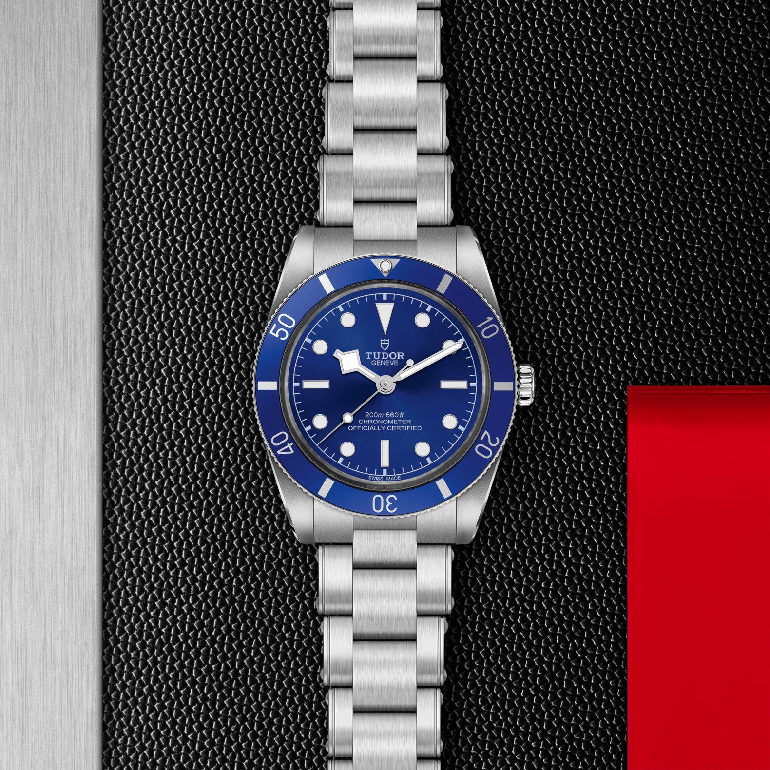 Silver watch with blue face on a textured black background
Tudor Black Bay 54 M79000B-0001 Bandiera Jewellers