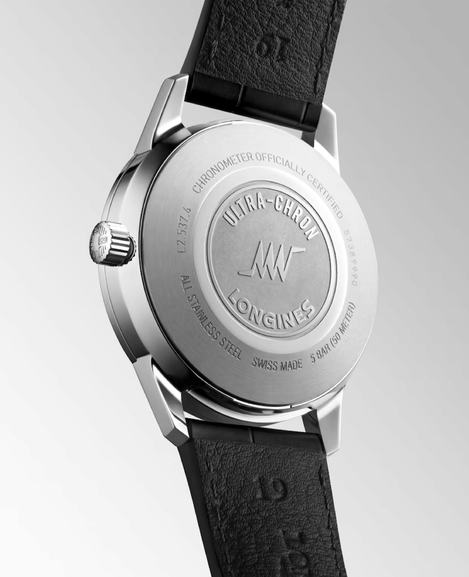 Back view of a Longines watch with brand engraving on a light gray background
Longines Ultra-Chron Classic Automatic L25374722 Bandiera Jewellers