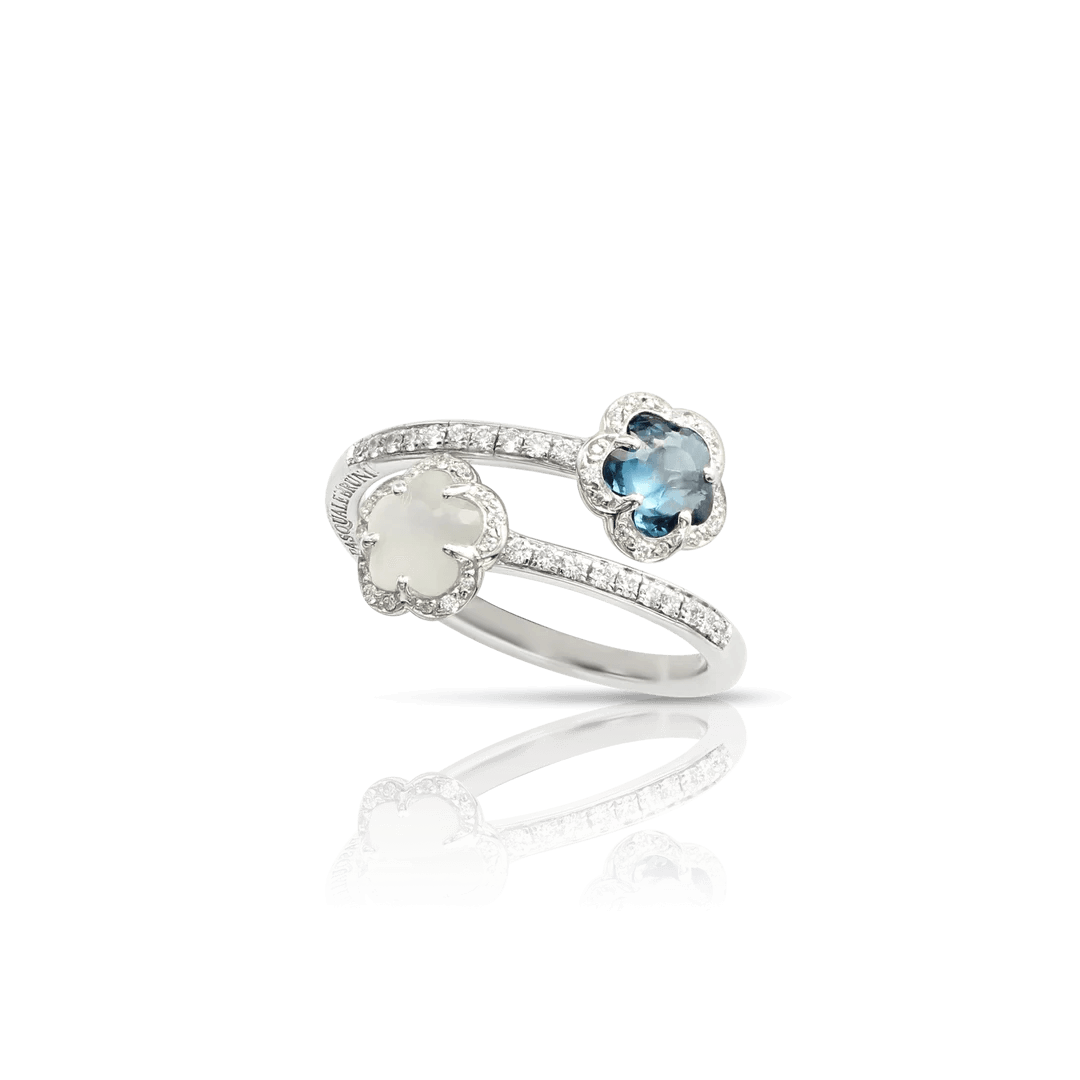 Silver ring with blue gemstone and moonstone on a white background

Pasquale Bruni Figlia Dei Fiori Contrarié Ring 15996B Bandiera Jewellers