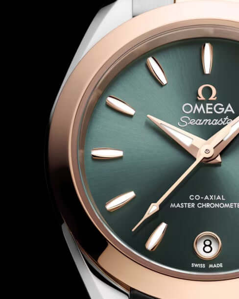 Two-tone Omega watch with green dial on a white background

Omega Seamaster Aqua Terra 150M 220.20.30.20.10.002 Bandiera Jewellers