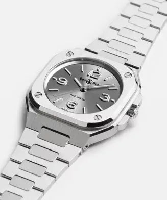 Silver watch with a metallic band on a white background

Bell & Ross BR-05 36mm Grey Steel BR05A-S-GR-ST/SST Bandiera Jewellers