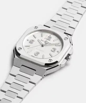 Silver watch with a white face on a white background

Bell & Ross BR-05 36mm Mother of Pearl Steel BR05A-S-MP-ST/SST Bandiera Jewellers
