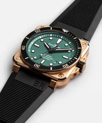 Watch with green dial and rose gold case on a white background

Bell & Ross BR-03 Diver Black & Green Bronze BR0392-D-LT-BR/SRB Bandiera Jewellers
