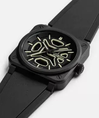 Black watch with a unique design on the dial against a white background

Bell & Ross BR-03 Skeleton Lum Ceramic BR03A-LM-SKCE/SRB Bandiera Jewellers