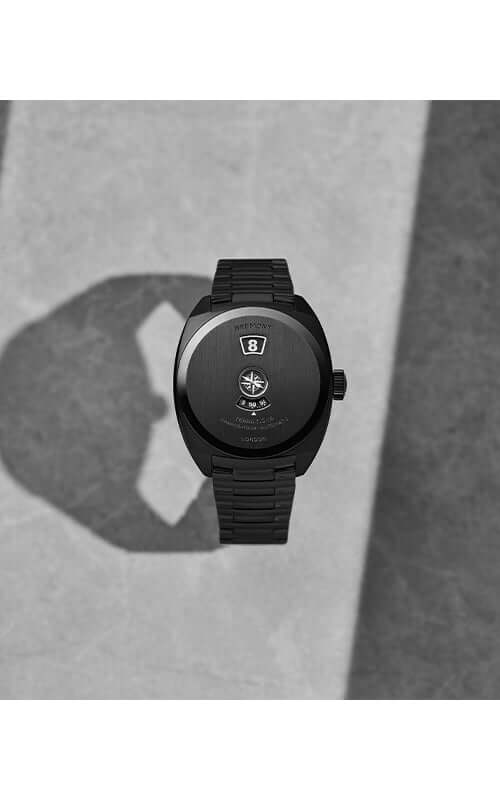 Black watch with a detailed face on a gray surface

Bremont Terra Nova Jumping Hour Stealth Black TN38-JH-DLC-CC-B Bandiera Jewellers