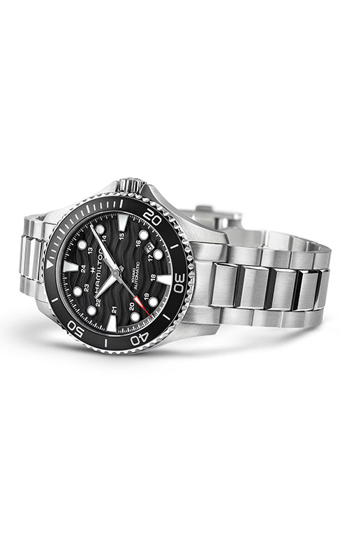 Silver watch with a black dial on a white background

Hamilton Khaki Navy Scuba H82415130 Bandiera Jewellers