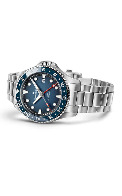 Silver watch with blue face and bezel on a white background

Hamilton Khaki Navy Scuba GMT H82535140 / Bandiera Jewellers