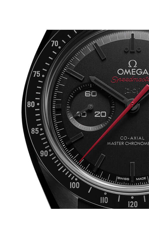 Close-up of a black Omega Speedmaster watch face with red second hand on a white background

Omega Speedmaster Dark Side of the Moon 310.92.44.51.01.001 Bandiera Jewellers