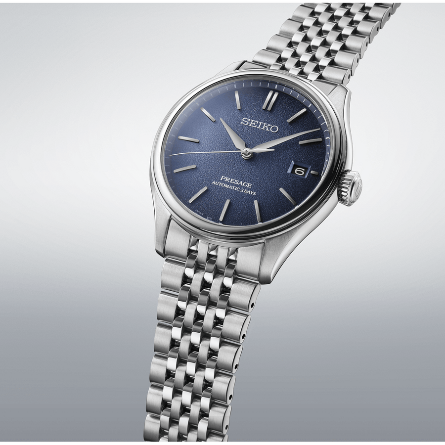 Seiko Presage watch with blue face and silver metal bracelet on a white background

Seiko Presage Classic Series SPB525J1 Bandiera Jewellers