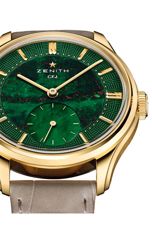 Zenith watch with green face and gold casing on a white background

Zenith G.F.J. CALIBRE 135 30.1865.0135/56.C216 Bandiera Jewellers