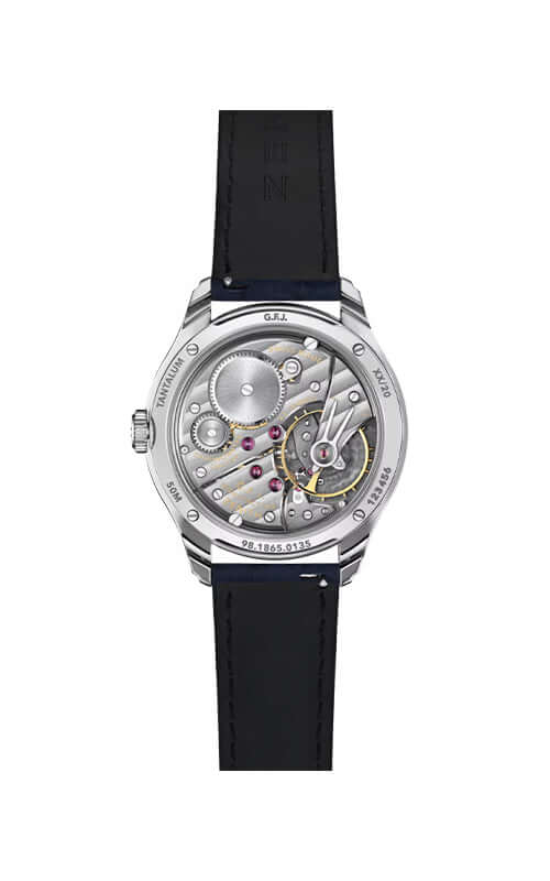 Watch with black strap and visible mechanical components on a white background

Zenith G.F.J. CALIBRE 135 98.1865.0135/21.C212 Bandiera Jewellers