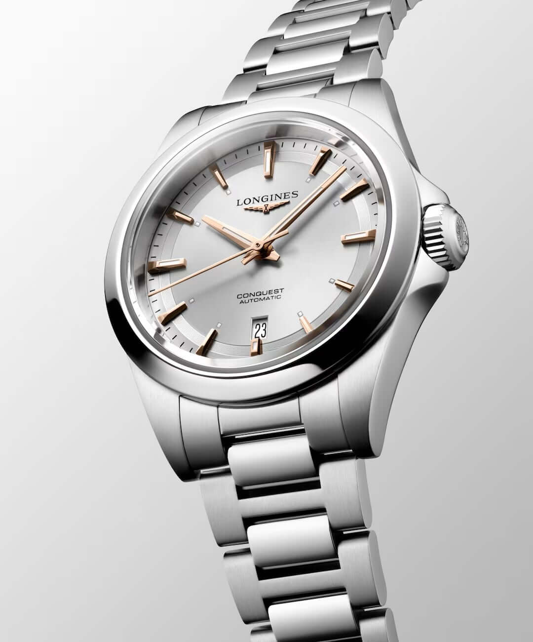 Silver Longines watch with a white face on a light gray background

Longines Conquest L33204726 Bandiera Jewellers