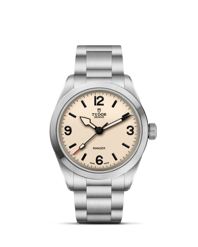 Silver Tudor watch with beige dial on a white background

Tudor Ranger M79950-0008 Bandiera Jewellers