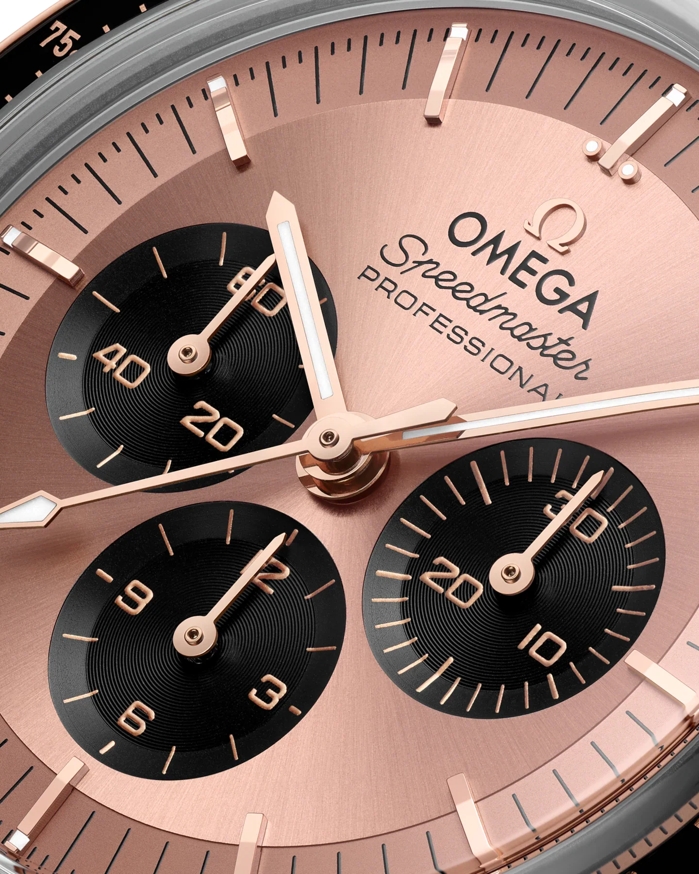 Close-up of a rose gold Omega watch with black sub-dials