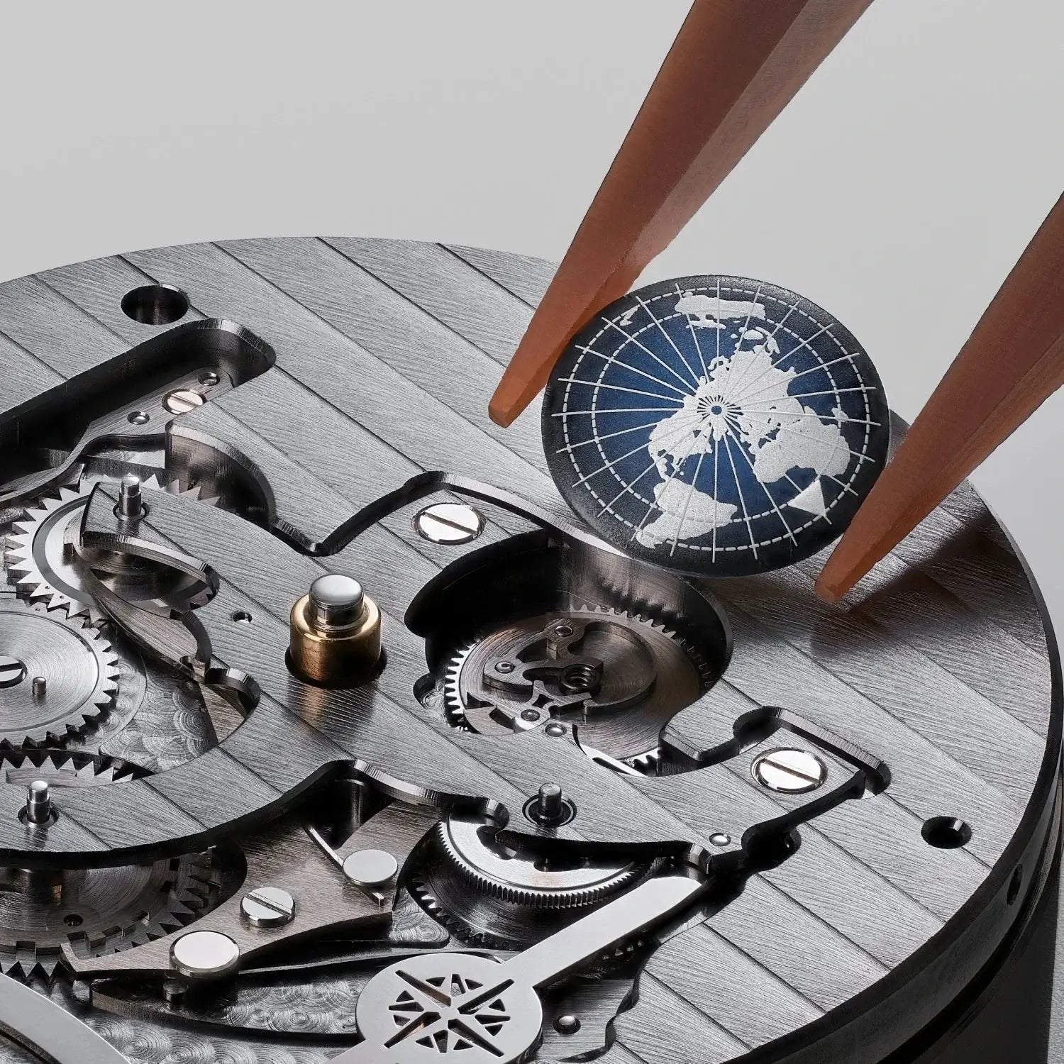 Close-up of a mechanical watch movement with a small world map globe on a light gray background.

Bremont Altitude Skeletonised Perpetual Calendar GMT ALT42-PER-TI-BLSKL-B Bandiera Jewellers