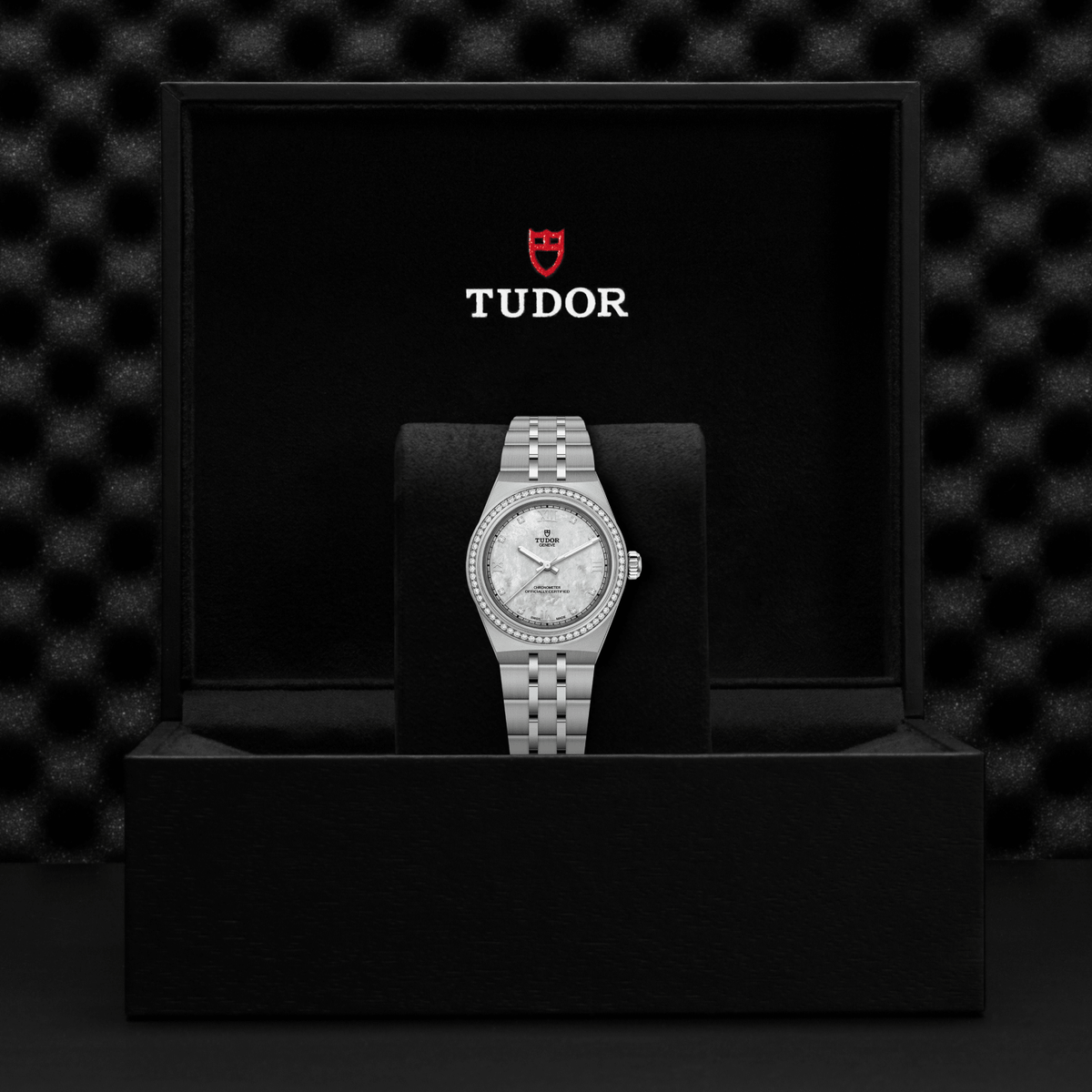 Silver watch on a black stand with Tudor logo in the background

Tudor Royal 30mm M2830A1S0-0001 Bandiera Jewellers