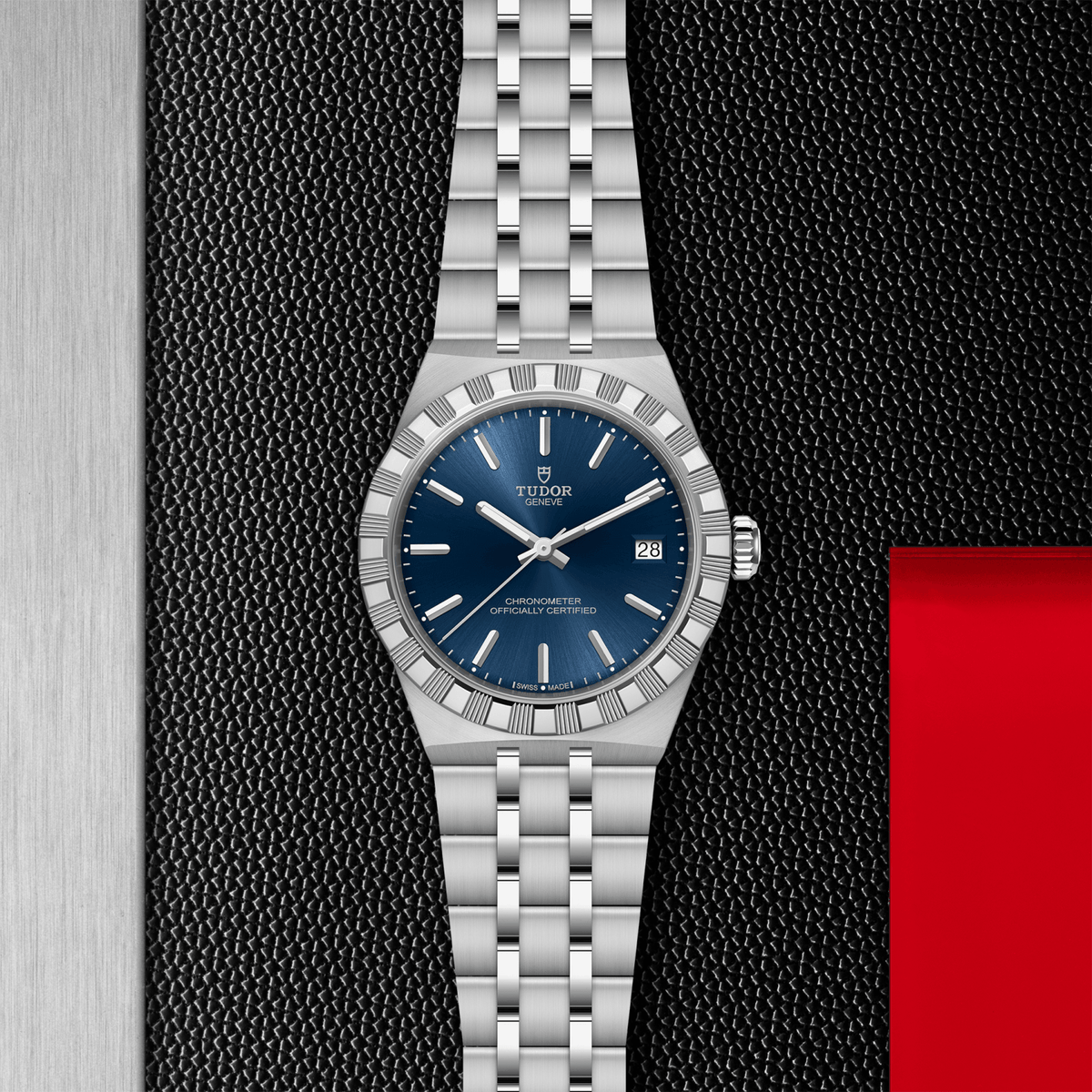 Silver watch with blue dial on a textured black background

Tudor Royal 36mm m2836c1a0-0102 Bandiera Jewellers
