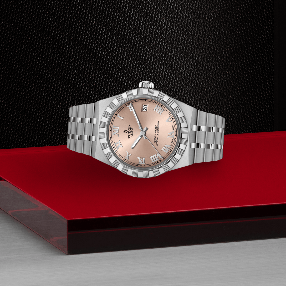 Silver watch with a pink face on a red platform against a black background

TUDOR Royal 36mm M2836C1A0-0105 Bandiera Jewellers