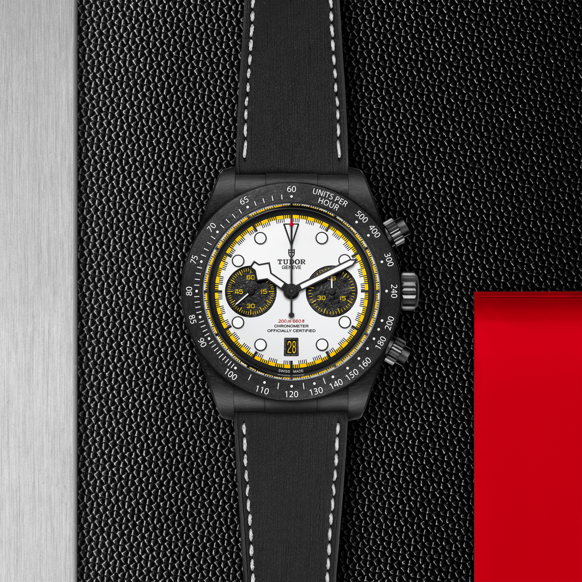 Black watch with a detailed face on a textured black background

Tudor Black Bay Chrono “Carbon 26” m79377kn-0003 Bandiera Jewellers