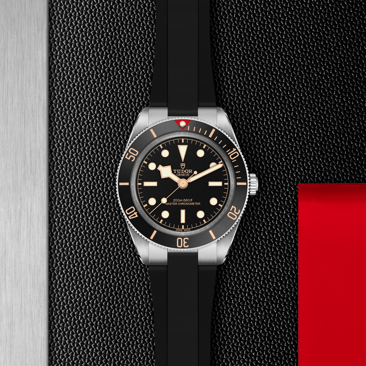 Watch with black strap and black dial on a textured surface

Tudor Black Bay 58 M7939A1A0NU-0003 Bandiera Jewellers